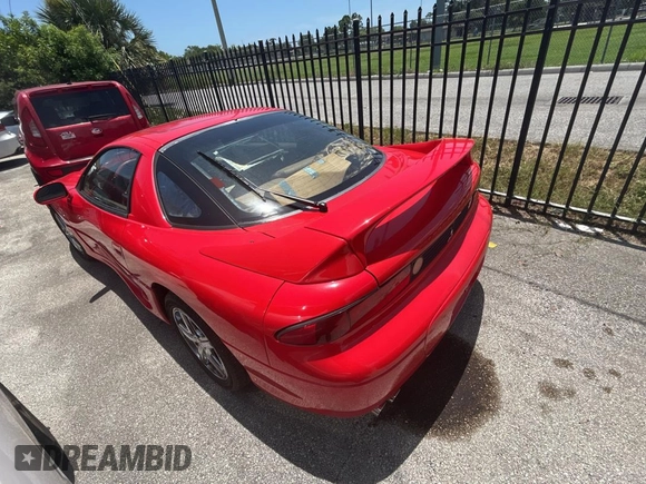 1999 Mitsubishi 3000GT GT z VIN JA3AM84J3XY001387, wystawiony jako Copart lot #61198735 z przebiegiem 137 514 mil mil oraz Czysty tytuł • Clean title. Historia ofert i sprzedaży dostępna na DreamBid. Obrazek 3.