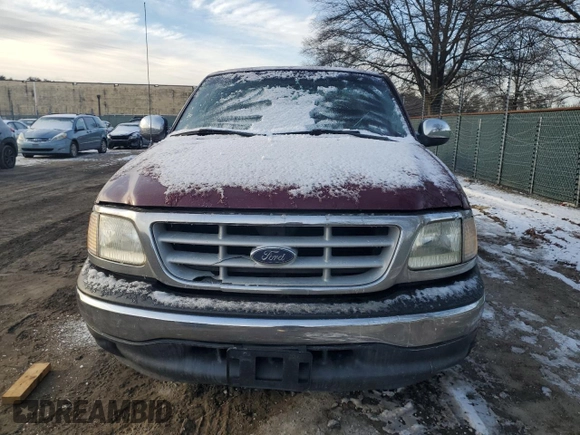 1999 Ford F-150 with VIN 1FTRF17W7XNA44872, listed as a Copart auction lot 41815695 with 182,678 mi miles and Salvage title. Bid and sale history available at DreamBid. Image 5.