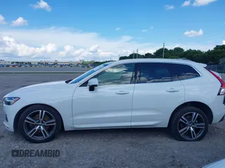 2021 Volvo XC60 Momentum with VIN YV4102DK6M1826828, listed as a IAAI auction lot 40603154 with 58,124 mi miles and . Bid and sale history available at DreamBid. Image 14.