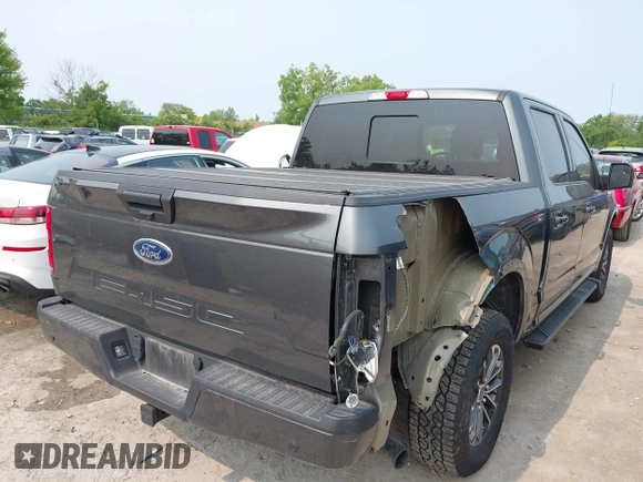 2020 Ford F-150 XL with VIN 1FTEW1EP1LFC21317, listed as a IAAI auction lot 42391410 with 77,999 mi miles and . Bid and sale history available at DreamBid. Image 4.