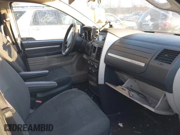 2010 Dodge Grand Caravan SE with VIN 2D4RN4DE8AR498559, listed as a IAAI auction lot 40886502 with Not Provided miles and . Bid and sale history available at DreamBid. Image 5.