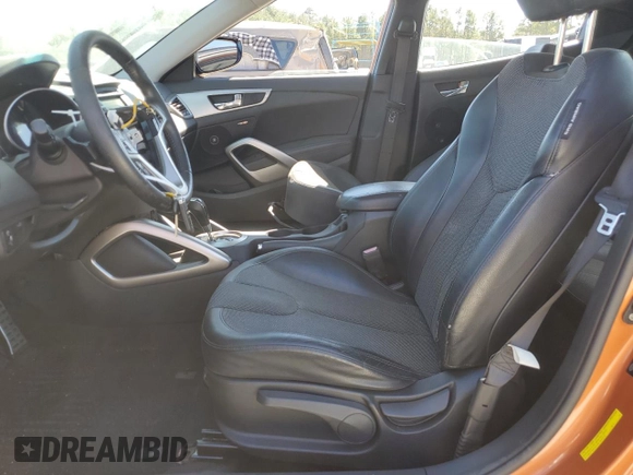 2012 Hyundai Veloster w/Red Int with VIN KMHTC6AD9CU044547, listed as a Copart auction lot 72633624 with 69,261 mi miles and Salvage title. Bid and sale history available at DreamBid. Image 7.