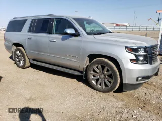 2017 Chevrolet Suburban Premier with VIN 1GNSKJKC4HR316953, listed as a Copart auction lot 76944884 with 105,753 mi miles and Salvage Title. Bid and sale history available at DreamBid. Image 4.