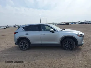 2017 Mazda CX-5 Grand Touring with VIN JM3KFBDL8H0227348, listed as a IAAI auction lot 41572377 with 124,908 mi miles. Bid and sale history available at carsss.com. Image 13.