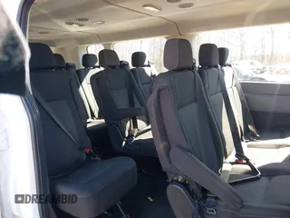 2021 Ford Transit Passenger XL with VIN 1FBAX2Y83MKA49312, listed as a IAAI auction lot 41806818 with 71,286 mi miles. Bid and sale history available at carsss.com. Image 8.