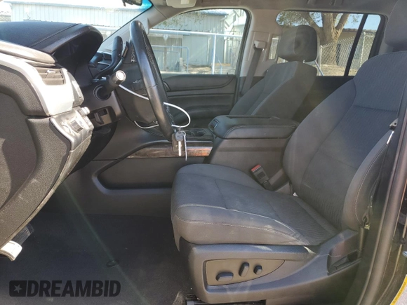 2019 Chevrolet Suburban LS with VIN 1GNSCGKC6KR180042, listed as a Copart auction lot 76829394 with 75,574 mi miles and Salvage title. Bid and sale history available at DreamBid. Image 7.