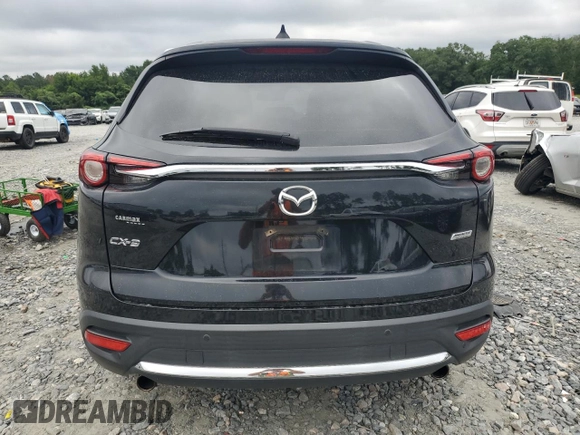 2016 Mazda CX-9 Grand Touring z VIN JM3TCADY7G0122768, wystawiony jako Copart lot #65624615 z przebiegiem 82 388 mil mil oraz Czysty tytuł • Clean title. Historia ofert i sprzedaży dostępna na DreamBid. Obrazek 6.