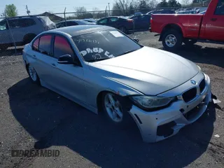 2012 BMW 3 Series 328i with VIN WBA3A5C55CFJ89595, listed as a IAAI auction lot 41926151 with 210,946 mi miles. Bid and sale history available at carsss.com. Image 1.