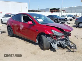 2024 Tesla Model Y Long Range z VIN 7SAYGDEEXRA236065, wystawiony jako IAAI lot #41834658 z przebiegiem 20 313 mil mil oraz . Historia ofert i sprzedaży dostępna na DreamBid. Obrazek 1.