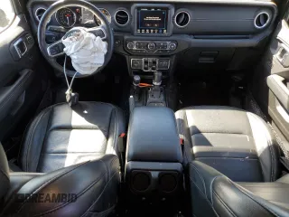 2023 Jeep Wrangler Sahara z VIN 1C4JJXP66PW605961, wystawiony jako Copart lot #50209655 z przebiegiem 32 805 mil mil oraz Szkoda całkowita • Salvage title. Historia ofert i sprzedaży dostępna na DreamBid. Obrazek 8.