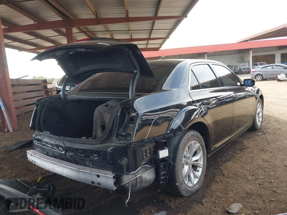 2016 Chrysler 300 Anniversary Edition with VIN 2C3CCAAG4GH141217, listed as a IAAI auction lot 42121809 with 74,739 mi miles and . Bid and sale history available at DreamBid. Image 4.