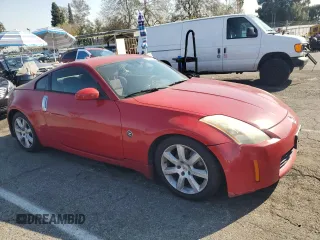 2004 Nissan 350Z Enthusiast with VIN JN1AZ34D24M103270, listed as a Copart auction lot 42976215 with 201,915 mi miles and Salvage Title. Bid and sale history available at DreamBid. Image 4.
