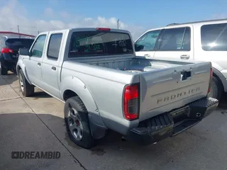 2001 Nissan Frontier z VIN 1N6MD27T91C386609, wystawiony jako IAAI lot #42304953 z przebiegiem 125 921 mil mil oraz . Historia ofert i sprzedaży dostępna na DreamBid. Obrazek 3.