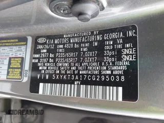 2012 Kia Sorento LX z VIN 5XYKT3A17CG295038, wystawiony jako IAAI lot #42294463 z przebiegiem 185 089 mil mil oraz . Historia ofert i sprzedaży dostępna na DreamBid. Obrazek 9.