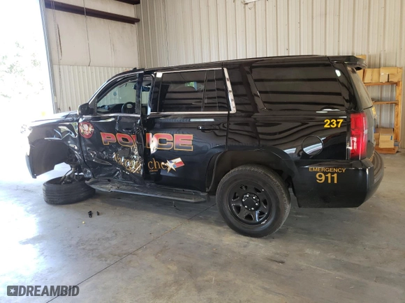 2020 Chevrolet Tahoe Commercial with VIN 1GNLCDEC1LR297818, listed as a Copart auction lot 74242524 with 35,716 mi miles and Salvage Title. Bid and sale history available at carsss.com. Image 2.