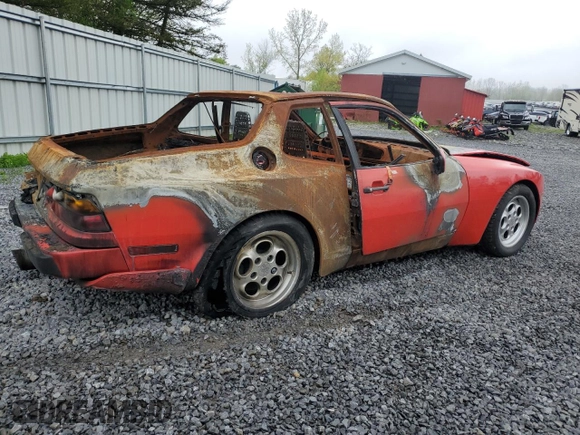 1986 Porsche 944 z VIN WP0AA0958GN152718, wystawiony jako Copart lot #55963875 z przebiegiem Nie podano mil oraz Szkoda całkowita • Salvage title. Historia ofert i sprzedaży dostępna na DreamBid. Obrazek 3.