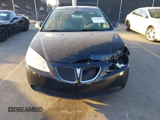 2006 Pontiac G6 GT with VIN 1G2ZH158064261302, listed as a IAAI auction lot 41790419 with 189,054 mi miles and . Bid and sale history available at DreamBid. Image 12.