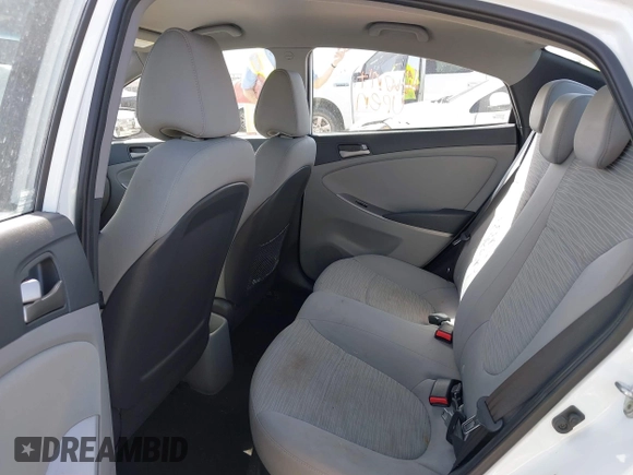2015 Hyundai Accent GLS with VIN KMHCT4AE3FU892067, listed as a IAAI auction lot 41752679 with 72,415 mi miles and . Bid and sale history available at DreamBid. Image 8.