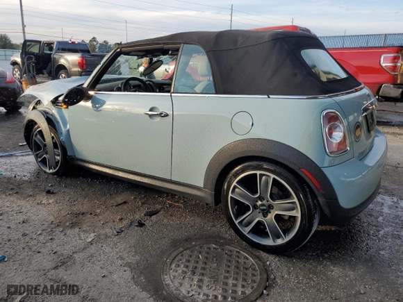 2012 MINI Cooper Convertible with VIN WMWZN3C59CT135351, listed as a Copart auction lot 86711044 with 93,515 mi miles and Non Repairable. Bid and sale history available at carsss.com. Image 2.
