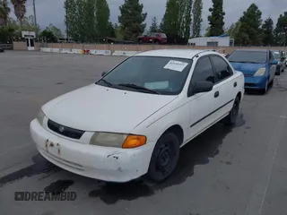 1997 Mazda Protege DX with VIN JM1BC1417V0156858, listed as a IAAI auction lot 42118339 with 187,673 mi miles and . Bid and sale history available at DreamBid. Image 6.