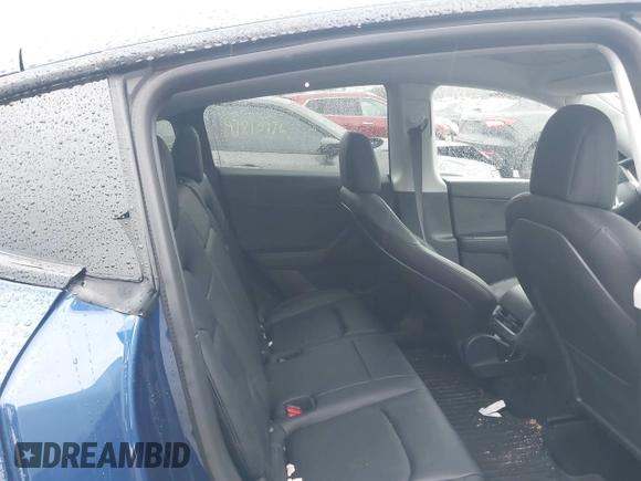 2021 Tesla Model Y Performance with VIN 5YJYGDEF5MF257262, listed as a IAAI auction lot 41721311 with 31,329 mi miles and . Bid and sale history available at DreamBid. Image 8.
