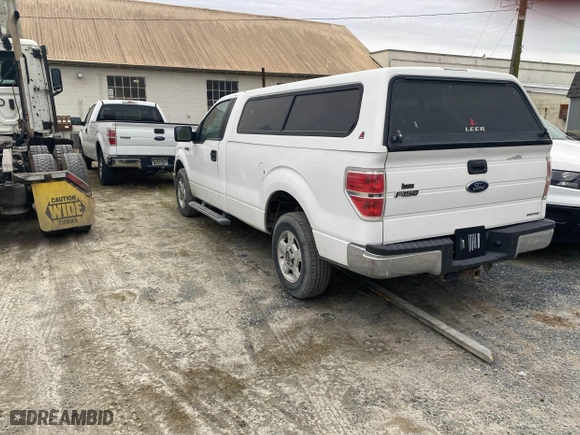 2014 Ford F-150 XL with VIN 1FTNF1CF5EKD79597, listed as a IAAI auction lot 41511800 with 100,758 mi miles. Bid and sale history available at carsss.com. Image 3.