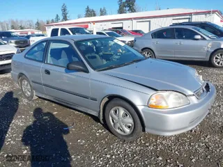 1997 Honda Civic DX with VIN 1HGEJ6223VL095214, listed as a IAAI auction lot 41560717 with 257,409 mi miles. Bid and sale history available at carsss.com. Image 1.