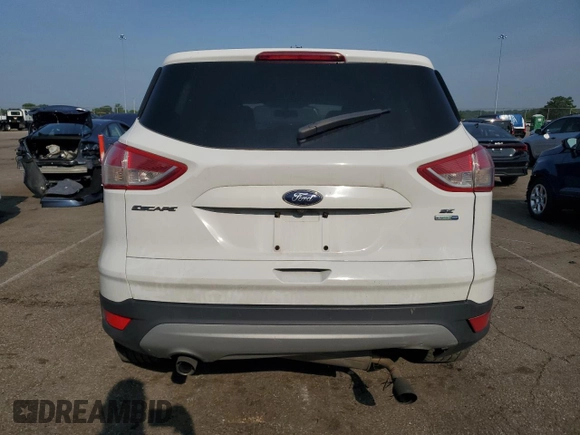 2014 Ford Escape SE z VIN 1FMCU9GX5EUC60849, wystawiony jako Copart lot #60498575 z przebiegiem Nie podano mil oraz Szkoda całkowita • Salvage title. Historia ofert i sprzedaży dostępna na DreamBid. Obrazek 6.