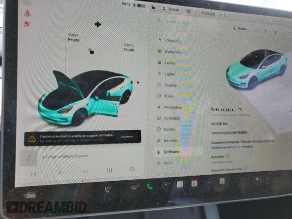 2021 Tesla Model 3 Standard Range Plus with VIN 5YJ3E1EA7MF053663, listed as a Copart auction lot 51982265 with 90,529 mi miles and Salvage Title. Bid and sale history available at DreamBid. Image 9.