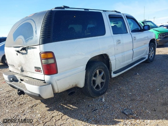 2002 GMC Yukon XL Denali with VIN 1GKFK66U32J316396, listed as a IAAI auction lot 41584644 with 1 mi miles. Bid and sale history available at carsss.com. Image 4.