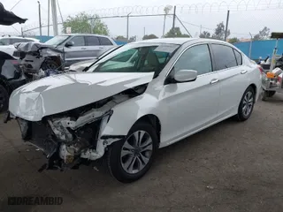 2014 Honda Accord Sedan LX with VIN 1HGCR2F34EA113940, listed as a IAAI auction lot 41896832 with 136,664 mi miles. Bid and sale history available at carsss.com. Image 2.