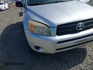 2006 Toyota RAV4 with VIN JTMZD33V965027925, listed as a IAAI auction lot 42084713 with 209,994 mi miles. Bid and sale history available at carsss.com. Image 6.