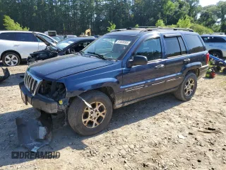 2000 Jeep Grand Cherokee Laredo with VIN 1J4GW48S2YC398116, listed as a Copart auction lot 61828385 with 251,791 mi miles and Clean title. Bid and sale history available at DreamBid. Image 1.