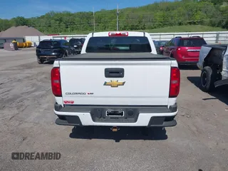 2020 Chevrolet Colorado 4WD Work Truck z VIN 1GCGTBEN4L1227194, wystawiony jako IAAI lot #42256116 z przebiegiem 76 635 mil mil oraz . Historia ofert i sprzedaży dostępna na DreamBid. Obrazek 16.