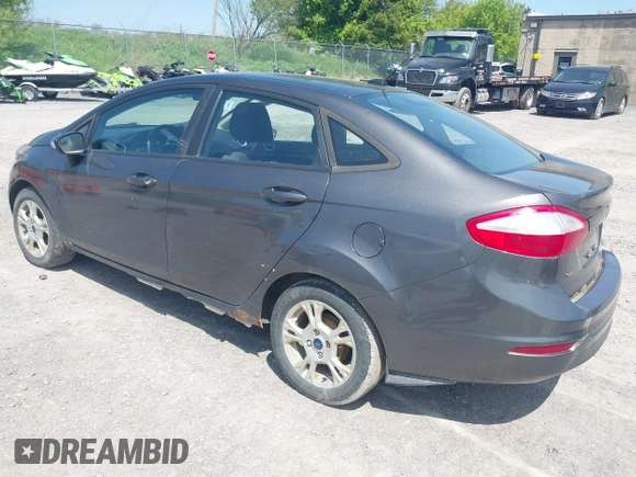 2015 Ford Fiesta SE with VIN 3FADP4BJ6FM160227, listed as a IAAI auction lot 42239191 with 131,614 mi miles and . Bid and sale history available at DreamBid. Image 3.