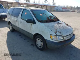 1998 Toyota Sienna LE with VIN 4T3ZF13C1WU052050, listed as a IAAI auction lot 41921780 with 144,769 mi miles. Bid and sale history available at carsss.com. Image 1.