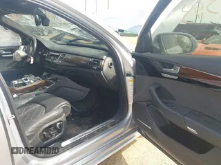 2016 Audi A8 Sport z VIN WAU43AFD0GN011518, wystawiony jako IAAI lot #42096343 z przebiegiem Nie podano mil oraz . Historia ofert i sprzedaży dostępna na DreamBid. Obrazek 5.