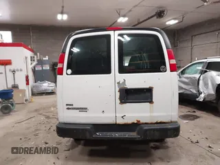 2012 Chevrolet Express Cargo Van with VIN 1GCWGGBA0C1100411, listed as a IAAI auction lot 41024219 with 197,251 mi miles. Bid and sale history available at carsss.com. Image 15.