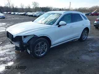 2023 Genesis GV70 2.5T with VIN KMUMADTB9PU116204, listed as a IAAI auction lot 41538174 with 19,950 mi miles. Bid and sale history available at carsss.com. Image 2.