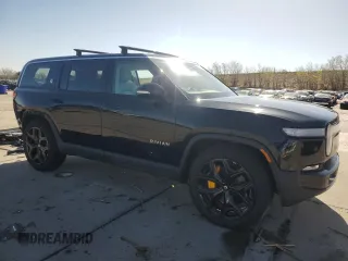 2023 Rivian R1S Adventure z VIN 7PDSGABA3PN025254, wystawiony jako Copart lot #53902505 z przebiegiem 15 570 mil mil oraz Szkody całkowita. Historia ofert i sprzedaży dostępna na DreamBid. Obrazek 4.