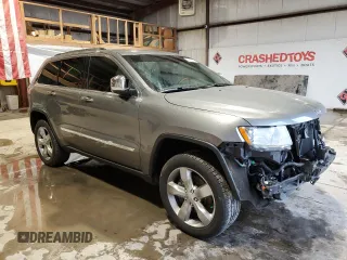 2013 Jeep Grand Cherokee Overland with VIN 1C4RJFCT5DC599866, listed as a Copart auction lot 51837395 with 105,521 mi miles and Salvage Title. Bid and sale history available at carsss.com. Image 4.