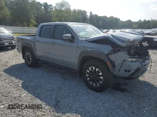 2023 Nissan Frontier PRO-4X with VIN 1N6ED1EK3PN653684, listed as a Copart auction lot 69177074 with 35,528 mi miles and Salvage Title. Bid and sale history available at carsss.com. Image 4.