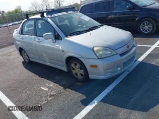 2002 Suzuki Aerio S z VIN JS2RA41S225106599, wystawiony jako IAAI lot #41926319 z przebiegiem 179 858 mil mil oraz . Historia ofert i sprzedaży dostępna na DreamBid. Obrazek 1.