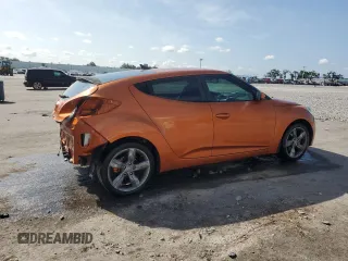 2013 Hyundai Veloster w/Gray Int z VIN KMHTC6AD1DU103219, wystawiony jako Copart lot #60426875 z przebiegiem 135 869 mil mil oraz Szkoda całkowita • Salvage title. Historia ofert i sprzedaży dostępna na DreamBid. Obrazek 3.