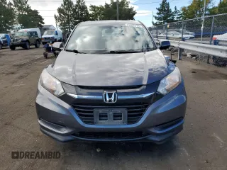 2018 Honda HR-V LX with VIN 3CZRU6H38JG703401, listed as a Copart auction lot 70567114 with 106,672 mi miles and Salvage Title. Bid and sale history available at carsss.com. Image 5.