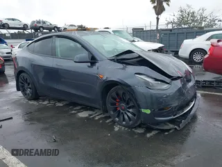 2023 Tesla Model Y Performance with VIN 7SAYGDEF0PF774282, listed as a IAAI auction lot 41807031 with Not Provided miles and . Bid and sale history available at DreamBid. Image 1.