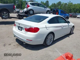 2014 BMW 4 Series 435i with VIN WBA3R1C52EF729201, listed as a IAAI auction lot 42579604 with 145,277 mi miles and . Bid and sale history available at DreamBid. Image 4.