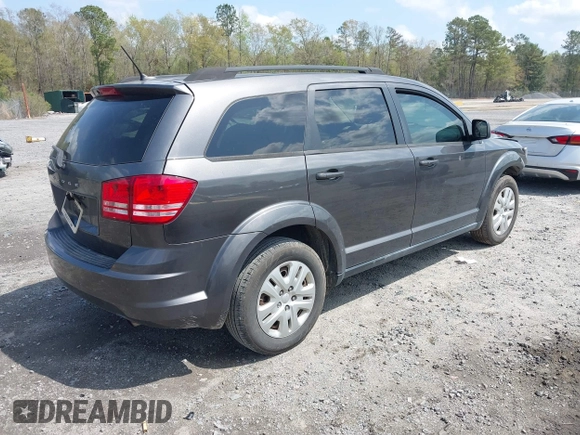 2017 Dodge Journey SE with VIN 3C4PDCABXHT538885, listed as a IAAI auction lot 41919599 with 170,311 mi miles and . Bid and sale history available at DreamBid. Image 4.