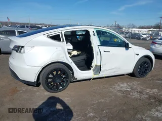 2022 Tesla Model Y Long Range with VIN 7SAYGAEE3NF337220, listed as a IAAI auction lot 41703912 with 46,319 mi miles and . Bid and sale history available at carsss.com. Image 6.