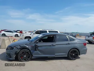 2020 Volkswagen Jetta GLI S z VIN 3VW6T7BU0LM047800, wystawiony jako IAAI lot #42263748 z przebiegiem 58 903 mil mil oraz . Historia ofert i sprzedaży dostępna na DreamBid. Obrazek 14.